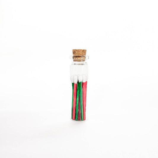 Festive Cheer Matches in Small Corked Vial